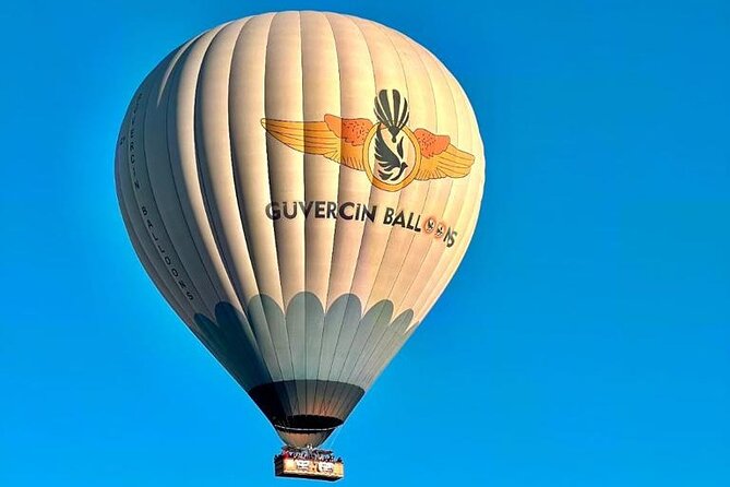Goreme/Cappadocia Sunrise Hot Air Balloon Flight with Pickup - From hotel transfer to launch field: watching balloons come alive