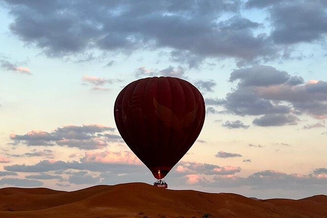 Hot Air Balloon Adventure Ride in Dubai with Hotel Pick up & drop - Landing on dunes and the post-flight wait you should expect