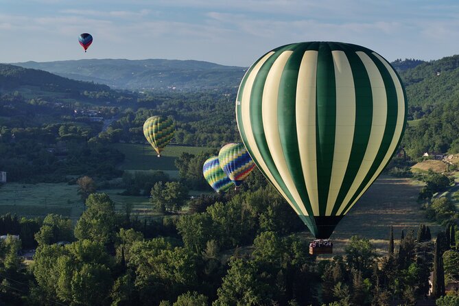 Hot air balloon over the hills of Pienza, Montalcino and Val D'Orcia - A 6:00 am sky over Pienza and Val d’Orcia
