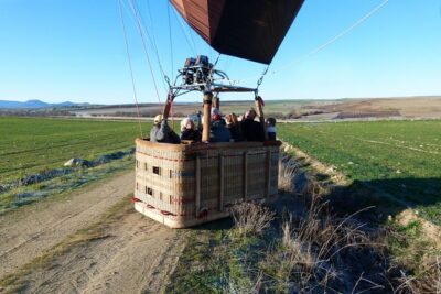 Hot Air Balloon Ride in Segovia with Toast, Picnic and Video - Flying over a World Heritage icon: the Segovia Aqueduct in the clouds