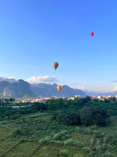 Vang Vieng: Hot Air Balloon Ride with City Hotel Pickup - The launch site moment: your English-speaking guide and the pilot