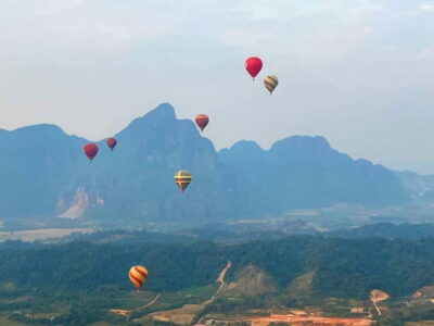 Vang Vieng: Hot Air Balloon Ride with City Hotel Pickup - Hotel pickup by tuk-tuk: sunrise and sunset timing that shapes your day